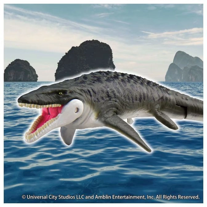  Mosasaurus toy with open mouth in water, islands in background.