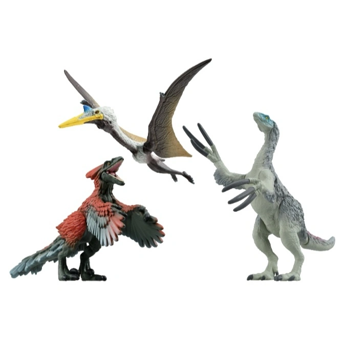  Three dinosaur toys: a feathered raptor, a pterodactyl, and a therizinosaurus with long claws.