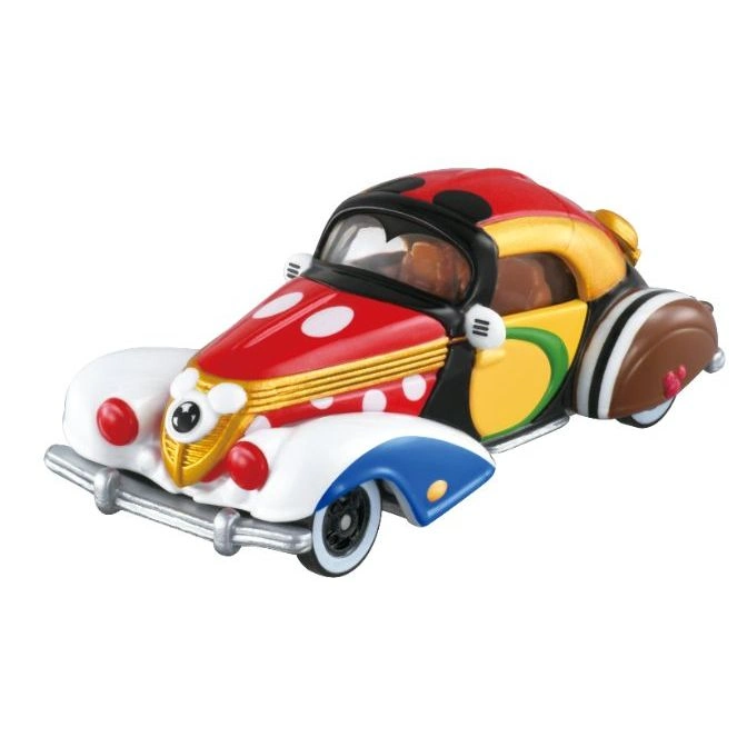 Cartoonish toy car with red, white, yellow, and brown colors. It has a polka dot pattern and a vintage design.
