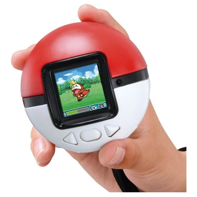 Pokémon Poké Ball toy with a screen showing a character at level 25, held in a hand.
