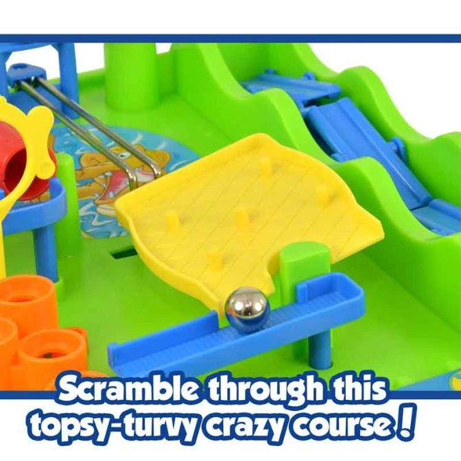  Marble run toy with yellow flipper, blue track, and silver ball. Text: "Scramble through this topsy-turvy crazy course!"