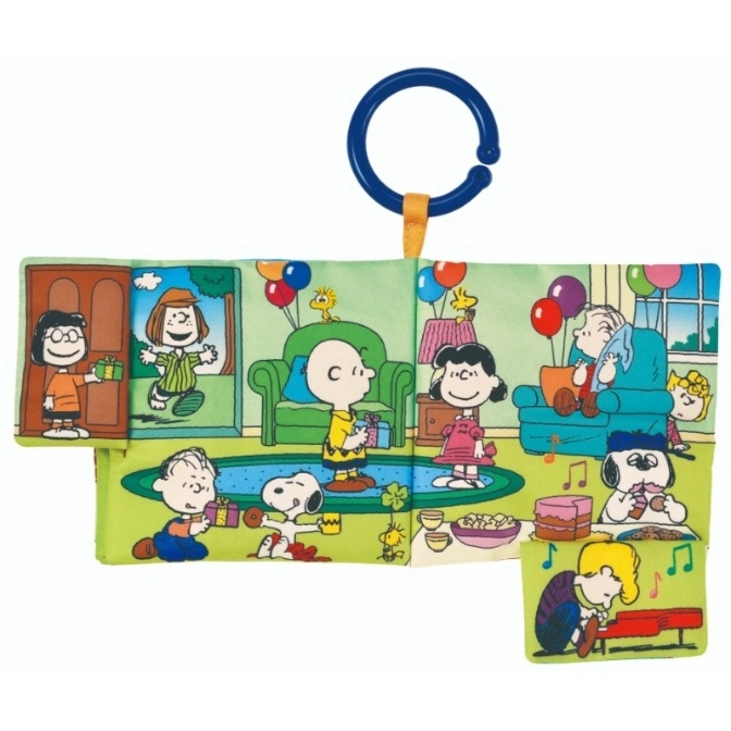  Peanuts soft book with a blue ring, featuring characters at a party with balloons and gifts.