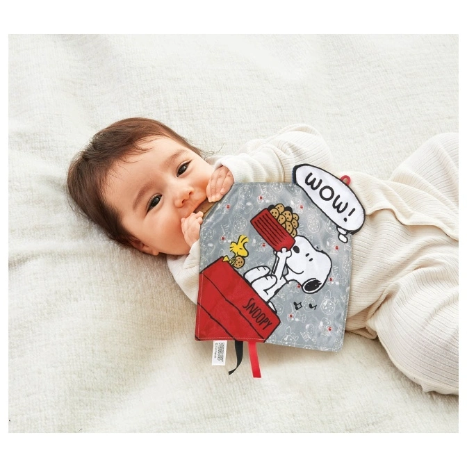  Baby with Snoopy soft book featuring Snoopy, Woodstock, and a "WOW!" speech bubble.