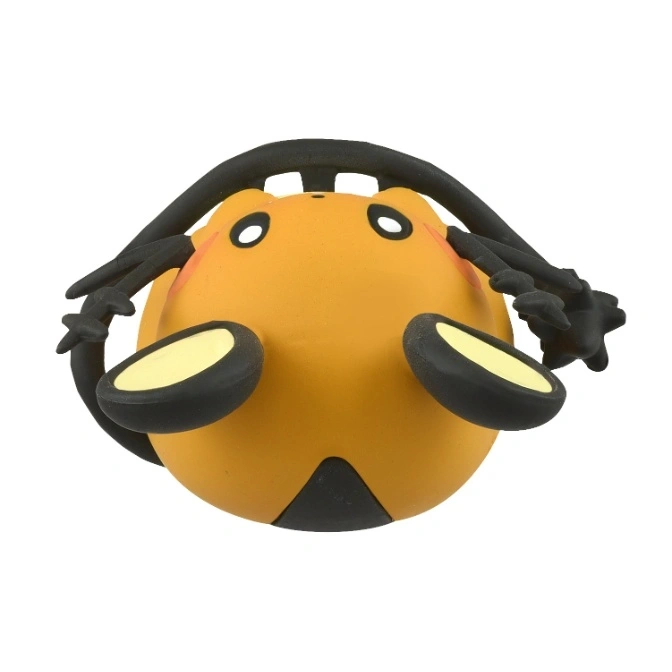  Orange Dedenne toy with black accents, lying on its back.