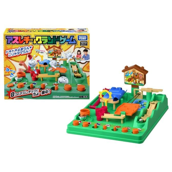  Takara Tomy's green marble run toy with obstacles and a box showing kids playing.