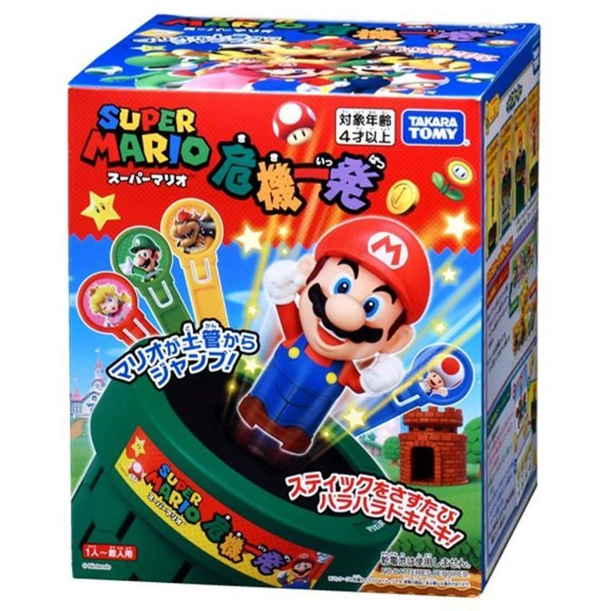  Super Mario action game: Mario jumps from a green pipe when sticks are inserted. Box shows characters and game details.