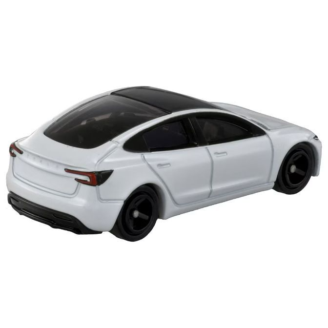  White toy Tesla Model 3 with black roof and wheels.