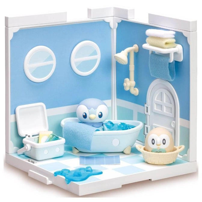 Toy bathroom playset with Piplup figure in tub, towels, shower, and accessories.