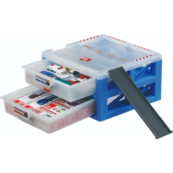  Toy parking garage with two pull-out drawers filled with toy cars and a gray ramp.