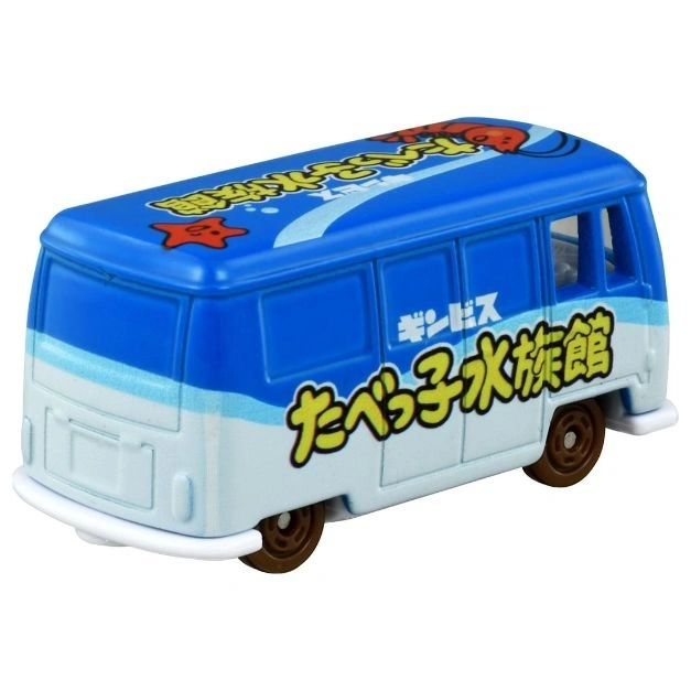  Blue and white toy bus with Japanese writing and sea creature graphics.
