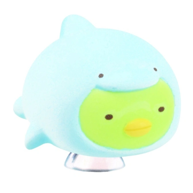  Green Sumikko Gurashi penguin in a light blue dolphin costume.