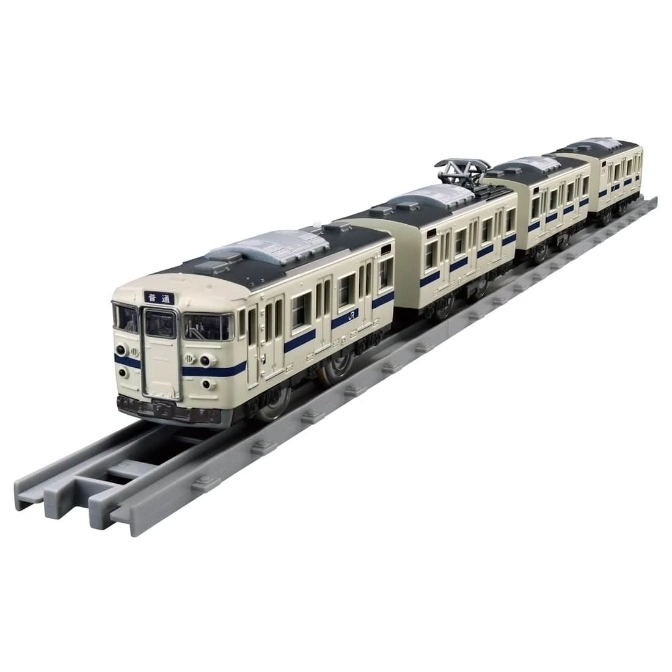 Toy train with multiple cars on a gray track. The train is cream with blue stripes.