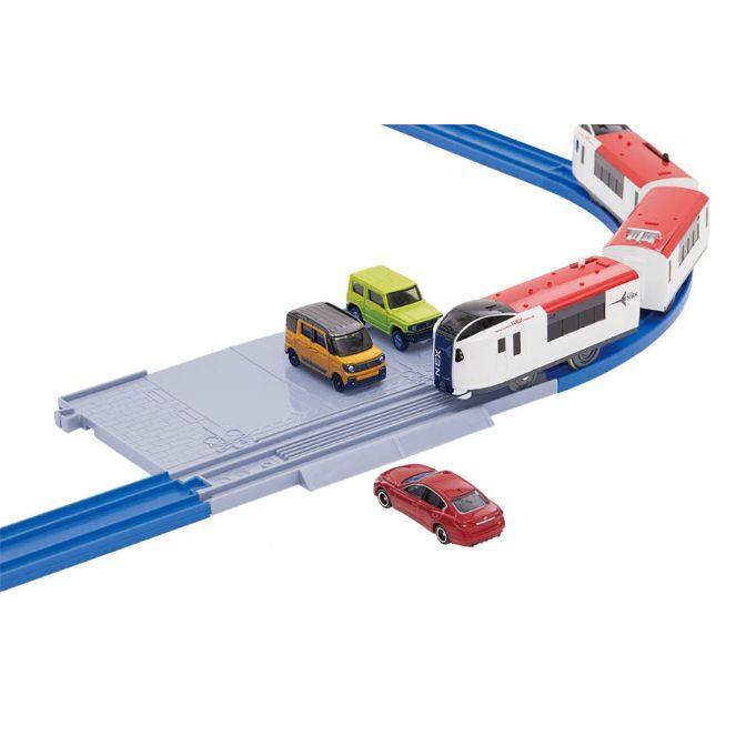  A toy train set with a train, cars, and tracks.
