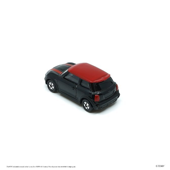 Black toy Mini Cooper with a red roof and racing stripe.