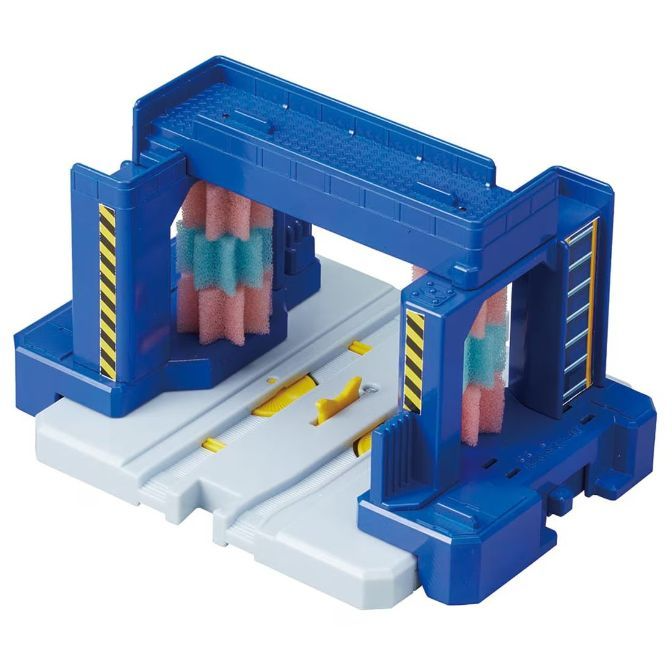 A toy car wash with blue supports and pink and green foam rollers.