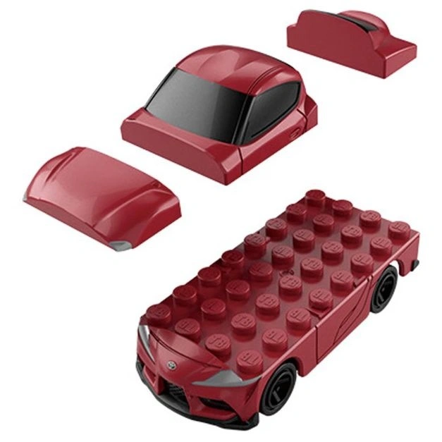  Red brick car toy with detachable roof, windshield, and hood pieces.