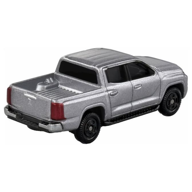  Silver toy pickup truck with black wheels and red taillights.