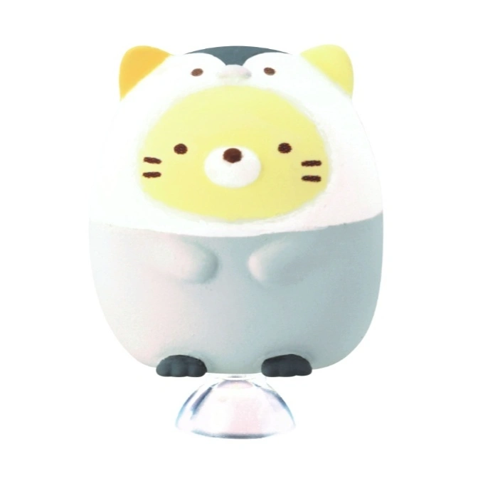  Sumikko Gurashi penguin plush toy with a bear costume, standing on a clear base.