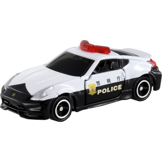 Toy police car with red lights, white top, and black bottom. 'Police' is written on the side.