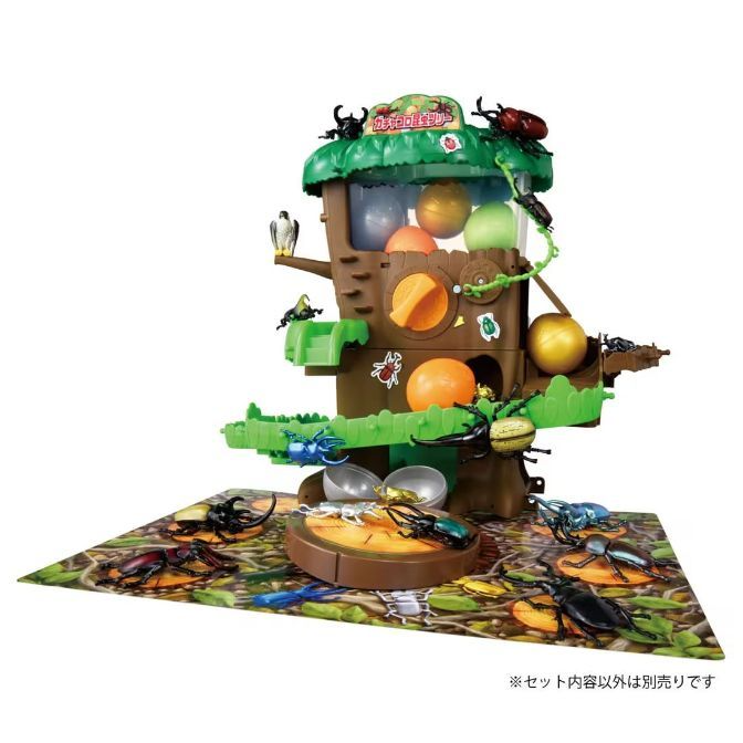 Bug catcher playset with treehouse, balls, and beetle figures on a leafy base.