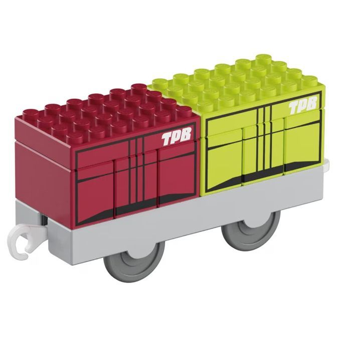  Toy train car with red and yellow blocks, labeled "TPB", on a gray base with wheels and a hook.