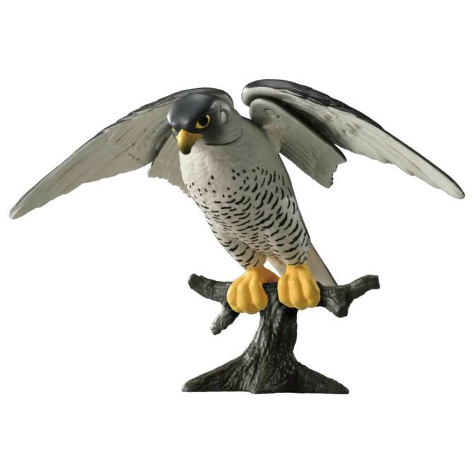 Toy falcon with spread wings perched on a branch, featuring yellow talons and a grey and white body.