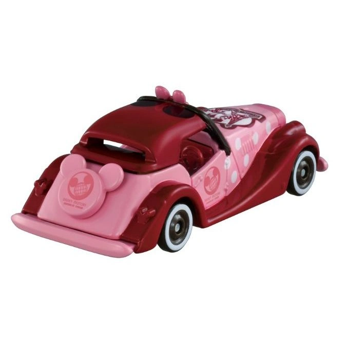  Pink Minnie Mouse toy car with red accents and polka dots.