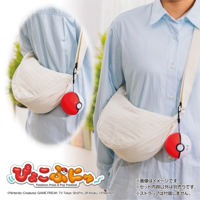  Person wearing a white bag with a Pokéball attached to the strap.