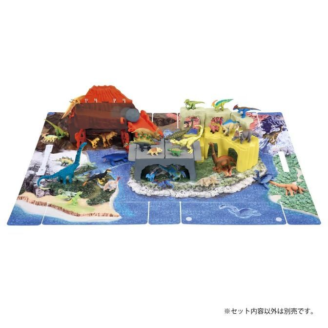 Dinosaur playset with volcano, platforms, and various dinosaur figures on a puzzle mat.