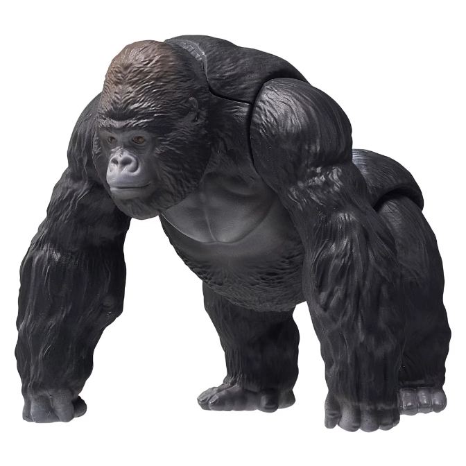 Toy gorilla with dark fur, silver chest, and brown head, standing on all fours.