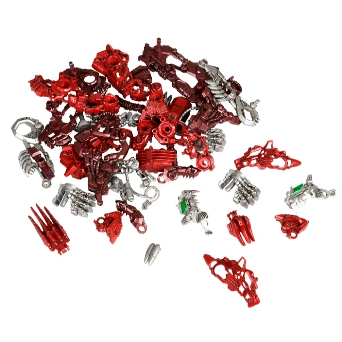  Pile of red and silver Bionicle toy pieces.