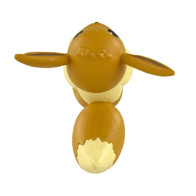  Eevee toy figure from above, showing its brown and cream coloring and large ears.