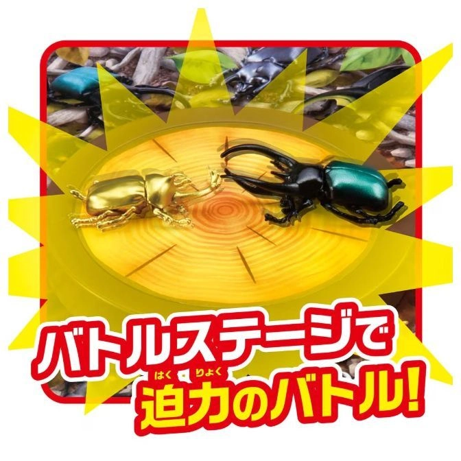  Toy beetle battle on a wood stage with Japanese text.