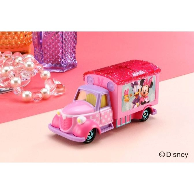  Pink Disney toy truck with Minnie and Daisy Duck graphics on the side.