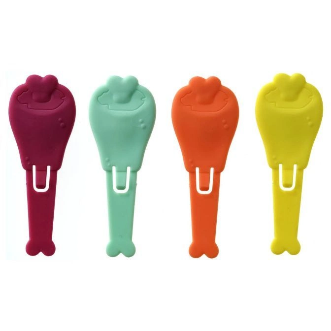  Four colorful silicone baby spoons with heart-shaped tops and U-shaped handles.