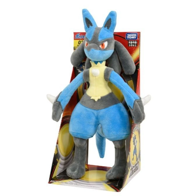  Lucario plush toy in packaging, blue and grey with yellow accents.