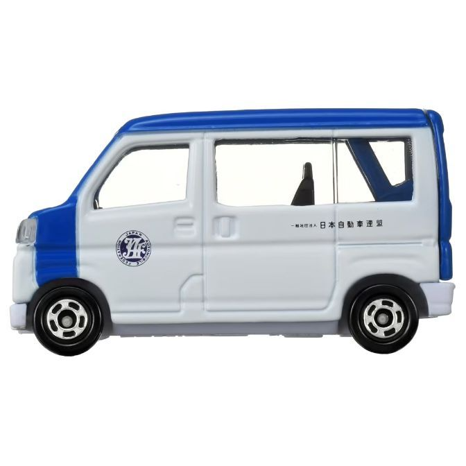  Blue and white toy van with Japanese writing and logo on the side.