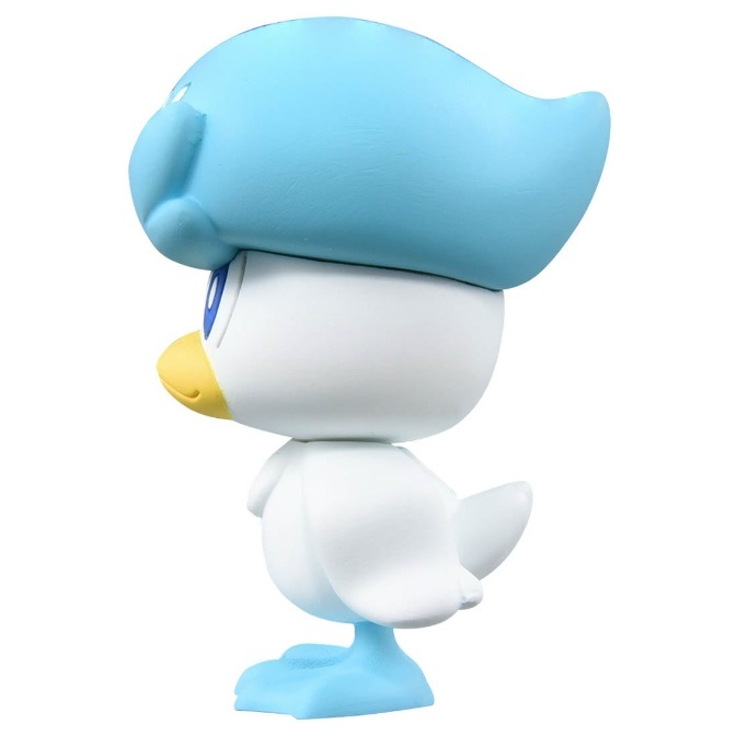 Quaxly toy figure with blue hat and feet, white body, and yellow beak.