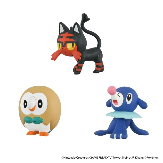 Three Pokémon figures: Litten, Rowlet, and Popplio, on a white background.