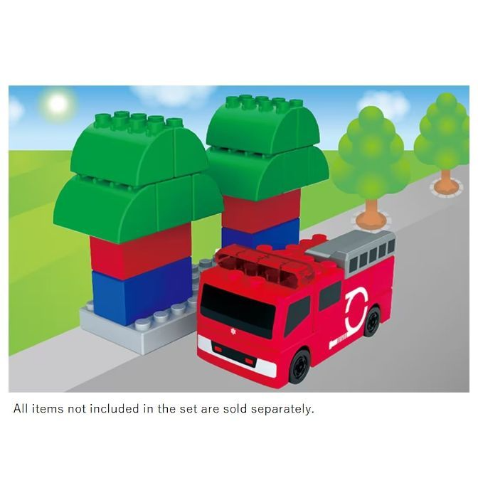  Toy fire truck and block trees on a playmat. Educational toy for kids.