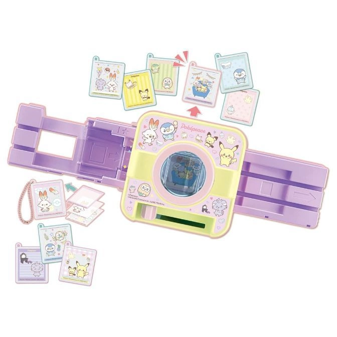 Pokémon Poképeace toy camera with interchangeable picture cards and a purple wristband.