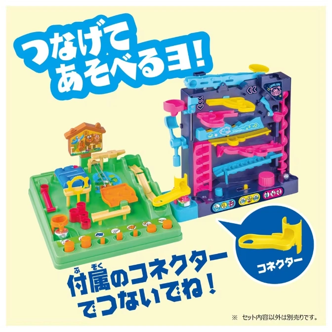  Toy marble run with a green base and a blue track tower. Includes ramps, slides, and connectors.