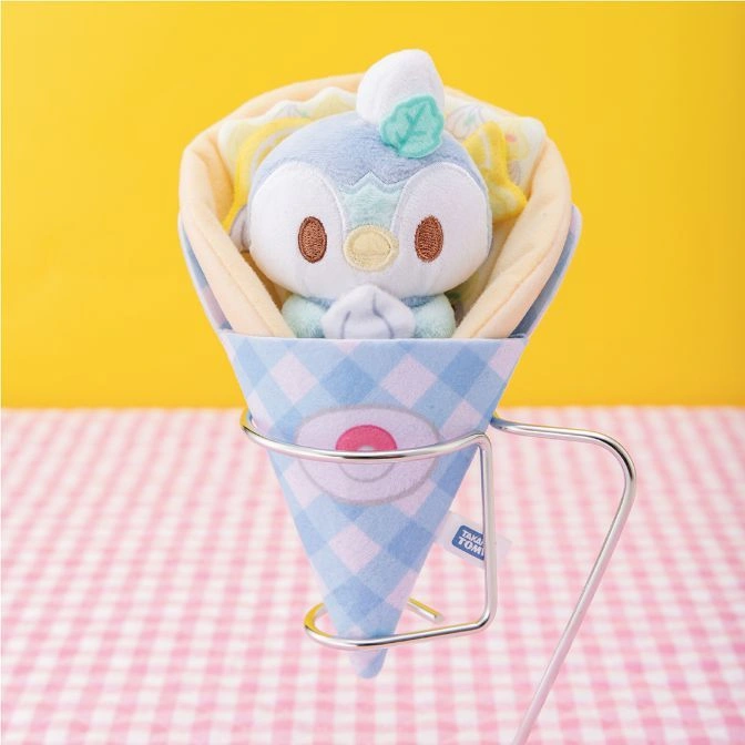  Piplup plush toy in a crepe holder. Cute Pokémon merchandise.