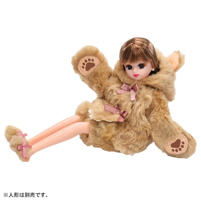  Doll wearing a teddy bear costume with paw prints and pink ribbons.