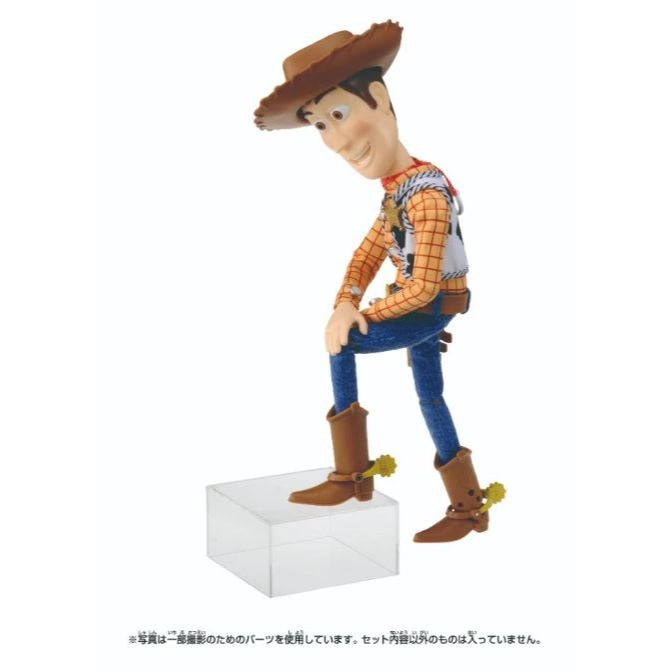  Woody toy figure in cowboy attire, posed on a clear stand.