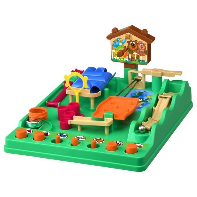 Green toy with ramps, levers, and a ball. Features a house-shaped sign with animal illustrations.