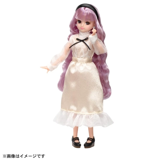 Doll with lavender hair, wearing a white dress and black shoes.