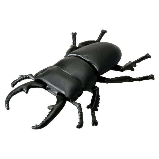 Black stag beetle toy with prominent mandibles and six legs.