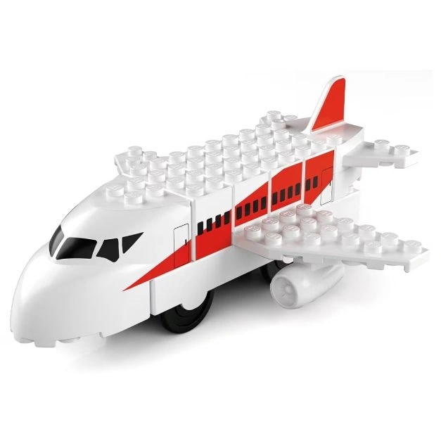 Toy airplane made of white and red building blocks with black wheels and cockpit windows.
