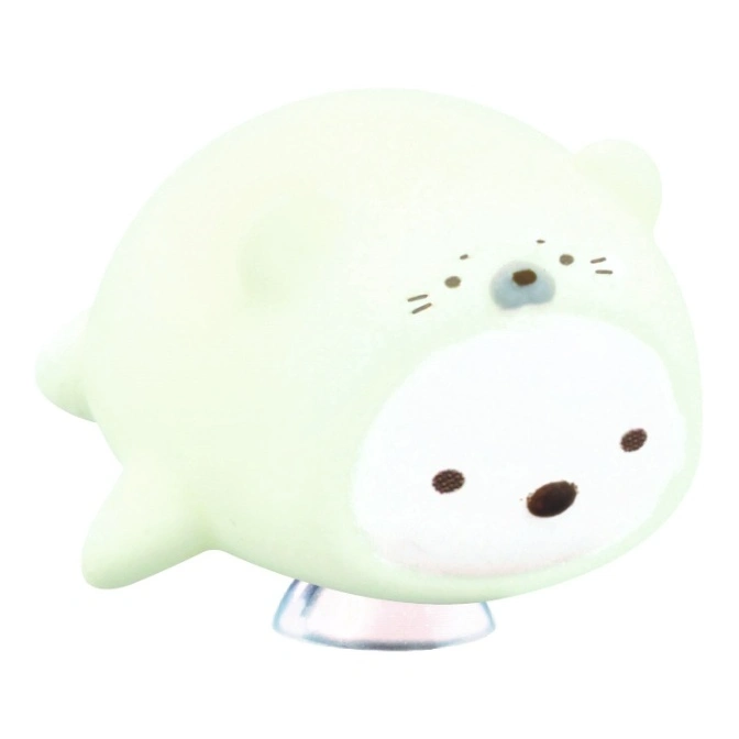  Light green seal plush toy with a white face and embroidered details.